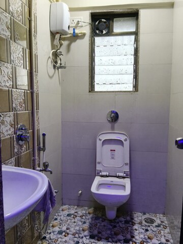 Bathroom in 2 BHK Apartment at Teachers Colony, Bandra East – for Rent