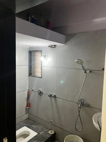 Bathroom in 1 BHK Apartment at Laxmi Annex, Goregaon West – for Rent