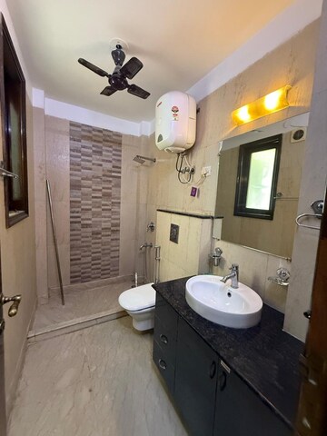 Bathroom in 3 BHK Builder Floor at Kalkaji – for Rent