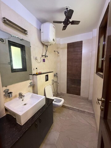 Bathroom in 3 BHK Builder Floor at Kalkaji – for Rent