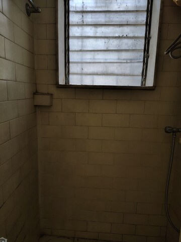 Bathroom in 1 BHK Apartment at Bharati Niwas, Santacruz West – for Rent