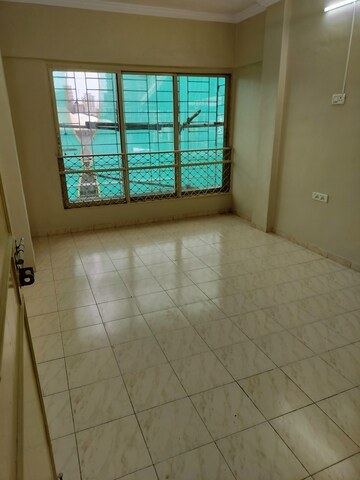 Room in 2 BHK Apartment at Cheval Class Royal Wing, Andheri West – for Rent
