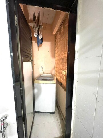 Bathroom in 1 BHK Apartment at Parijat Gardens Marigold CHS, Kasarvadavali – for Rent