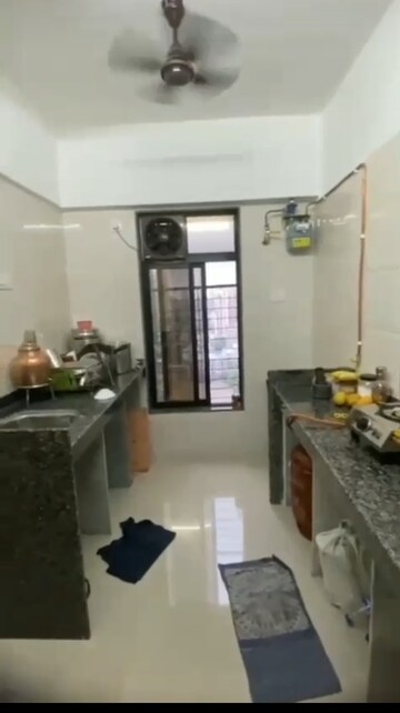 Kitchen in 1 BHK Apartment at Yash Amogh, Lalbaug – for Rent