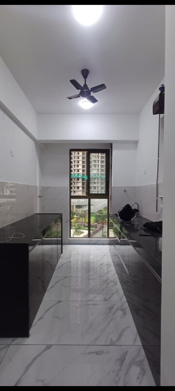 Kitchen in 2 BHK Apartment at Raymond Ten X Habitat, Pokhran Road No Two – for Rent