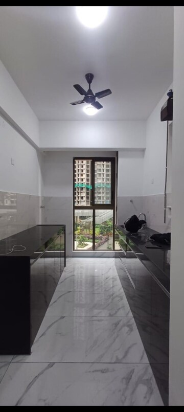 Kitchen in 2 BHK Apartment at Raymond Ten X Habitat, Pokhran Road No Two – for Rent