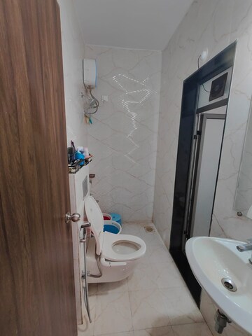Bathroom in 1 BHK Apartment at Joshi Amar Vaishali CHS, Naupada – for Rent