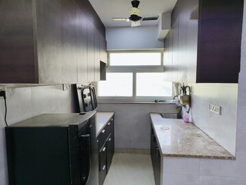 Kitchen in Studio Builder Floor at Moti Nagar – for Rent