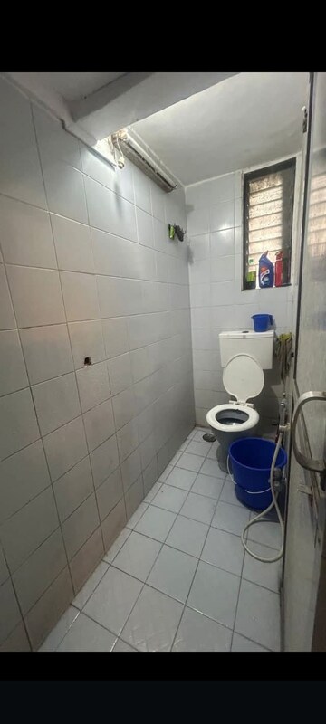 Bathroom in 1 BHK Apartment at Indradarshan II, Oshiwara – for Rent