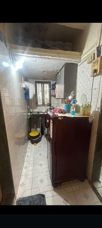 Kitchen in 1 BHK Apartment at Indradarshan II, Oshiwara – for Rent
