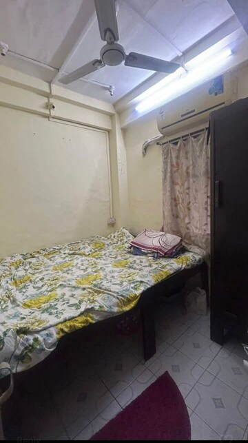 Bedroom in 1 BHK Apartment at Indradarshan II, Oshiwara – for Rent