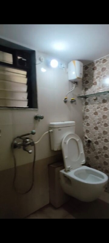Bathroom in 2 BHK Apartment at Lucky  Nine Galaxy, Mira Road – for Rent