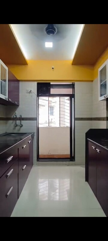 Kitchen in 2 BHK Apartment at Lucky  Nine Galaxy, Mira Road – for Rent