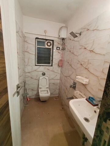 Bathroom in 3 BHK Apartment at Niwara CHS Andheri West, Andheri West – for Rent