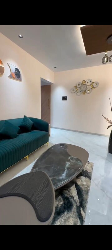 Living Room in 1 BHK Apartment at Lucky Ostwal Paradise, Mira Road – for Sale