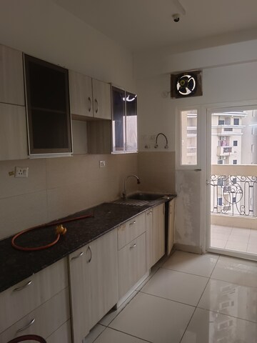 Kitchen in 2 BHK Apartment at Supertech The Romano, Sector 118 – for Rent
