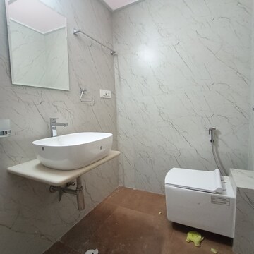 Bathroom in 3 BHK Apartment at Shraddha Elite, Poisar – for Rent