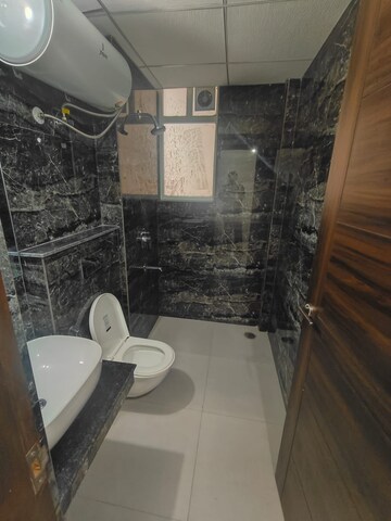 Bathroom in 3 BHK Apartment at Artique Uptown Skylla, International Airport Road – for Rent
