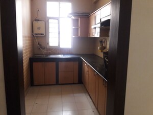 Kitchen in 2 BHK Apartment at Jaipuria Sunrise Greens, Ahinsa Khand 1 – for Sale
