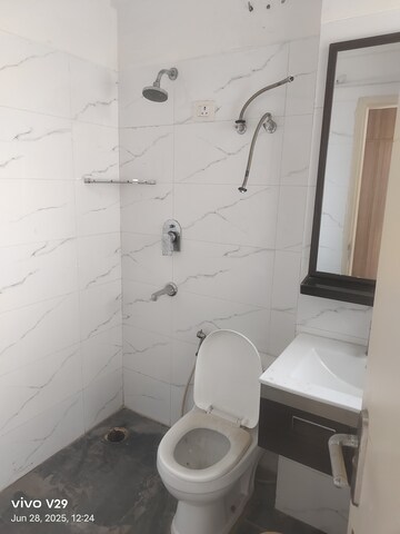 Bathroom in 3 BHK Apartment at Tata Raheja Raisina Residency, Sector 59 – for Rent