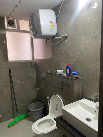 Bathroom in 3 BHK Apartment at Artique Uptown Skylla, International Airport Road – for Rent