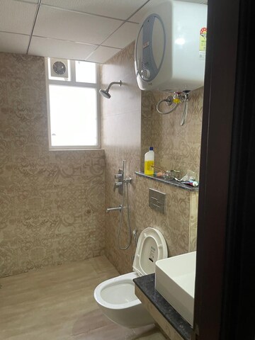 Bathroom in 3 BHK Apartment at Artique Uptown Skylla, International Airport Road – for Rent