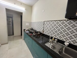 Kitchen in 2 BHK Apartment at Vijay Galaxy, Waghbil – for Sale