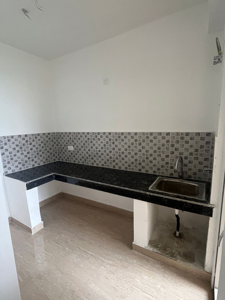 Kitchen, aditya-world-city 2.5 Bedroom 950 Sq.Ft. Apartment In Shahpur Bamheta Ghaziabad 8948886