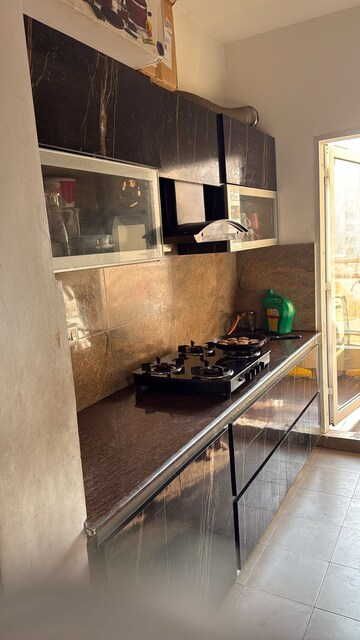 Kitchen in 3 BHK Apartment at Supertech Cape Town, Sector 74 – for Rent