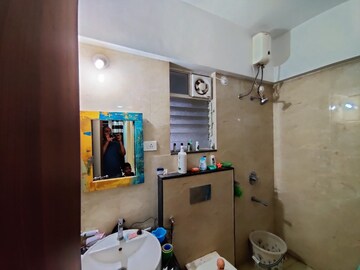 Bathroom in 2 BHK Apartment at Aaiji Lakeshore Residences, Dhanori – for Rent