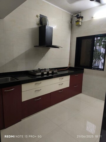 Kitchen in 2 BHK Apartment at Gokuldham Complex, Goregaon East – for Sale