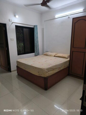 Bedroom in 2 BHK Apartment at Gokuldham Complex, Goregaon East – for Sale