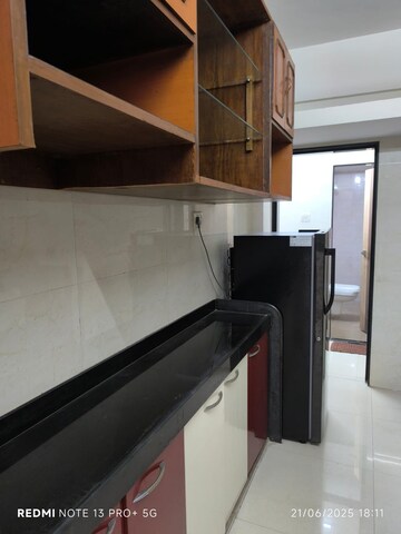 Kitchen in 2 BHK Apartment at Gokuldham Complex, Goregaon East – for Sale