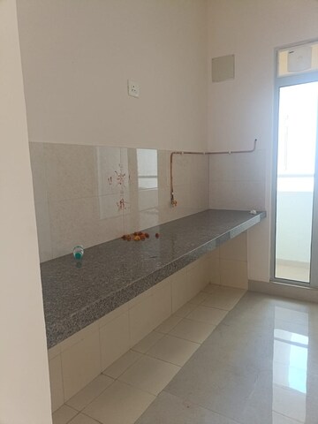Kitchen in 2 BHK Apartment at Piramal Vaikunth, Balkum Pada – for Rent