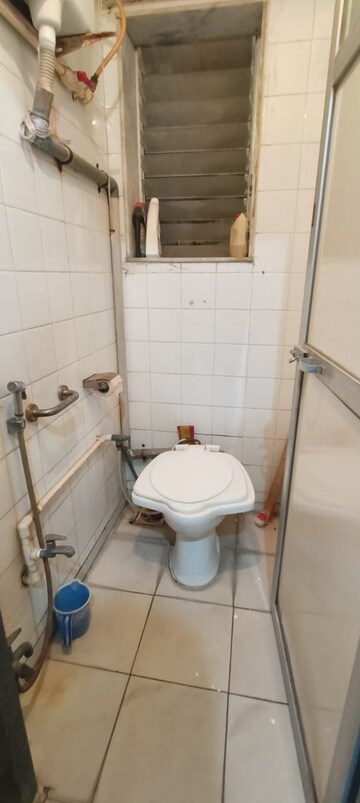 Bathroom in 1 BHK Apartment at Vishnu Nagar – for Rent