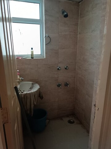 Bathroom in 1 BHK Apartment at Wave Dream Homes, Wave City – for Rent