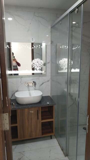 Bathroom in 3 BHK Builder Floor at ERA Green World, Sector 8 – for Sale