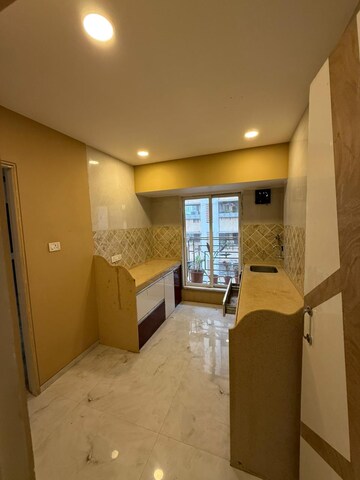 Living Room in 2 BHK Apartment at Mohini Castle, Khar West – for Rent