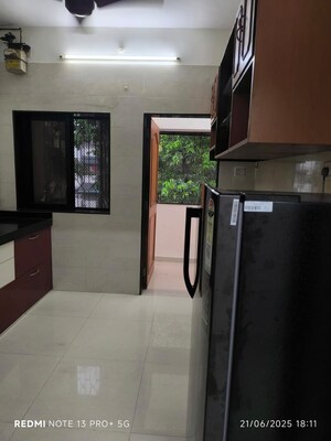 Kitchen in 2 BHK Apartment at Swagat Housing Society, Goregaon East – for Sale