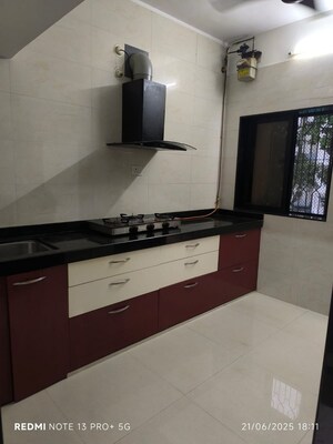 Kitchen in 2 BHK Apartment at Swagat Housing Society, Goregaon East – for Sale