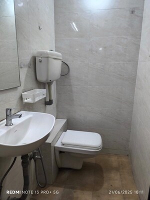 Bathroom in 2 BHK Apartment at Swagat Housing Society, Goregaon East – for Sale