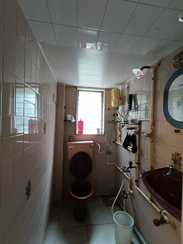Bathroom in 2 BHK Apartment at Nityanand Apartment, Andheri West – for Rent