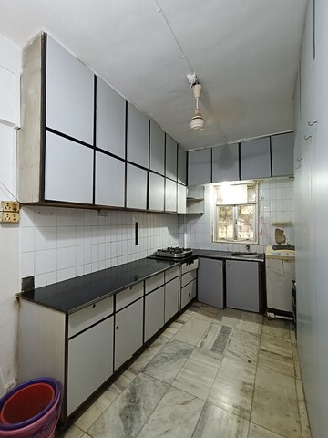 Kitchen in 2 BHK Apartment at Nityanand Apartment, Andheri West – for Rent