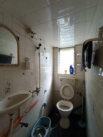 Bathroom in 2 BHK Apartment at Nityanand Apartment, Andheri West – for Rent