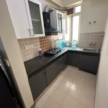 Kitchen in 2 BHK Apartment at Shree Vardhman Mantra, Ramgarh Dhani – for Rent