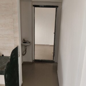 Building Lobby in 1 BHK Apartment at Aniruddha Enclave, Kamothe Sector 22 – for Sale