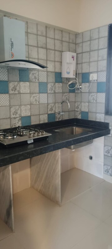 Kitchen in 2 BHK Apartment at Paradise Sai Icon, Kharghar – for Rent