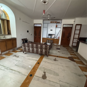 Living Room in 3 BHK Builder Floor at Ansal Plaza Sector-23, Carterpuri Village – for Rent