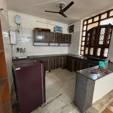 Kitchen in 3 BHK Builder Floor at Ansal Plaza Sector-23, Carterpuri Village – for Rent
