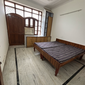 Bedroom in 3 BHK Builder Floor at Ansal Plaza Sector-23, Carterpuri Village – for Rent